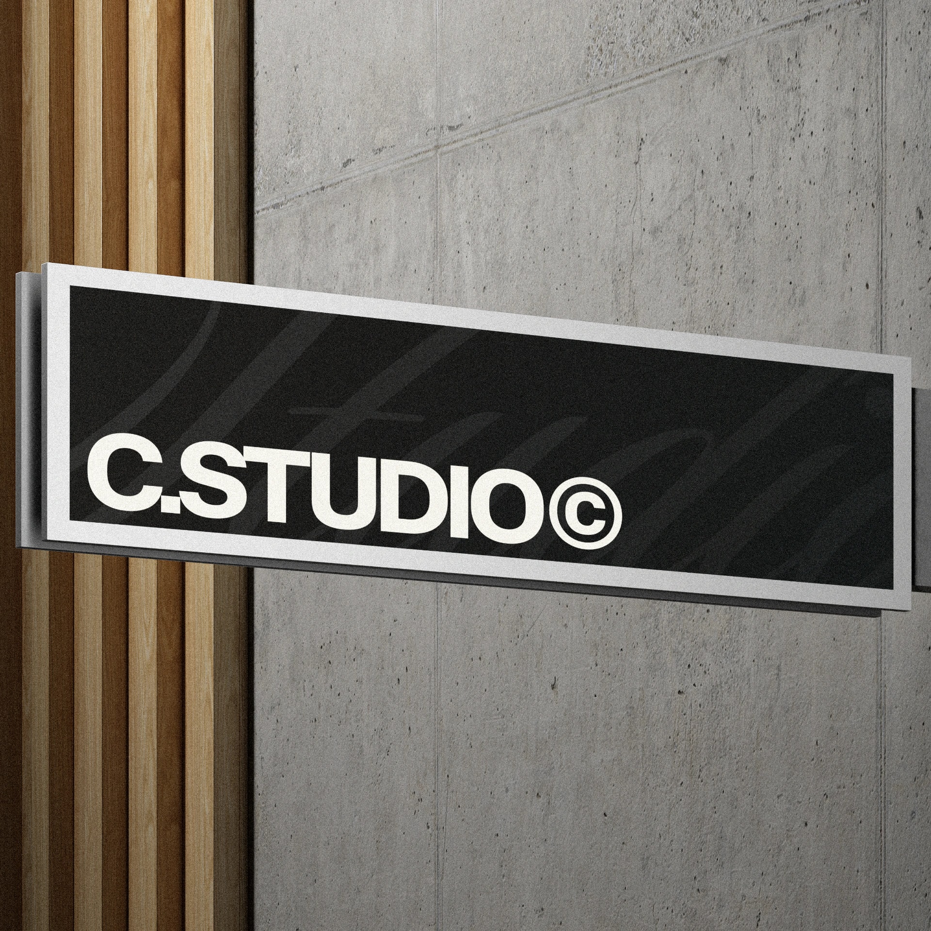 Modernes C.Studio Firmenschild an Betonwand als Beispiel für Markendesign und Brand Identity
