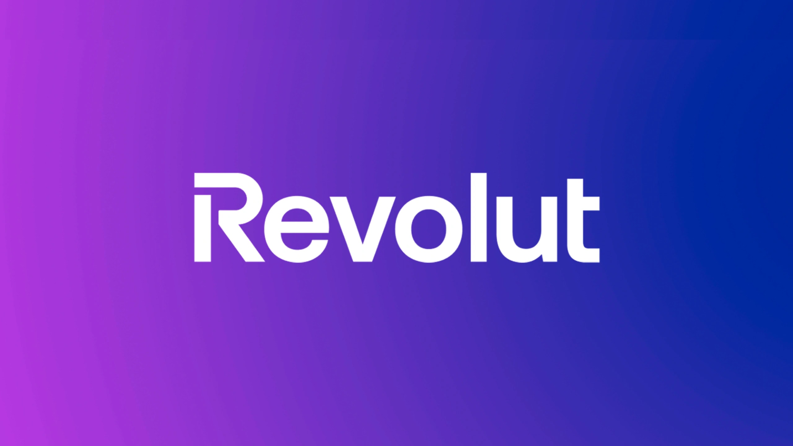 Revolut Logo in Weiss auf violett-blauem Farbverlauf als Beispiel fuer Markenidentitaet